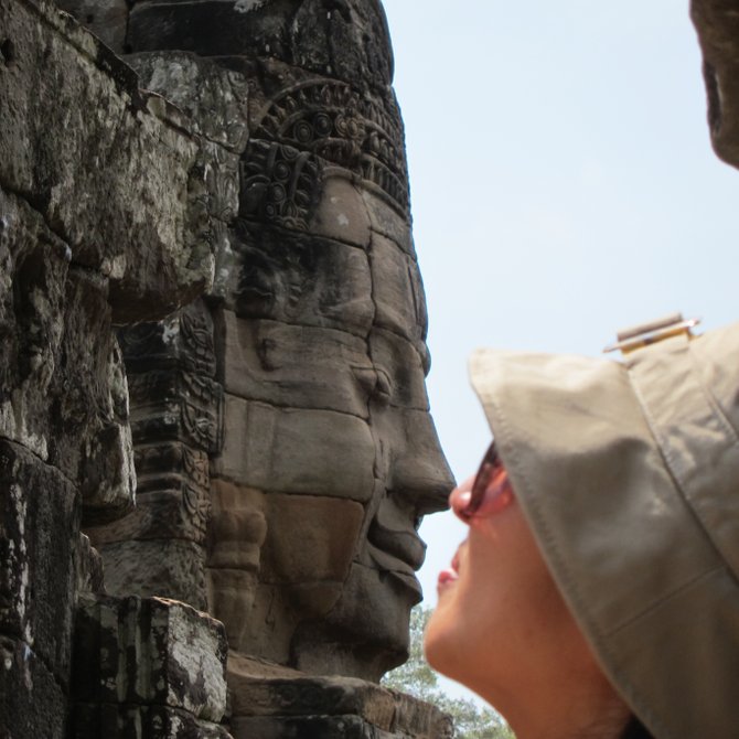I was in the Bayon temples in Cambodia last month. I loved it! I was told that this is the kissing Buddha pose.
