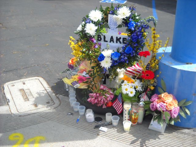 Memorial at Canon and Rosecrans St. to Blake-a motorcyclist recently killed in a crash.