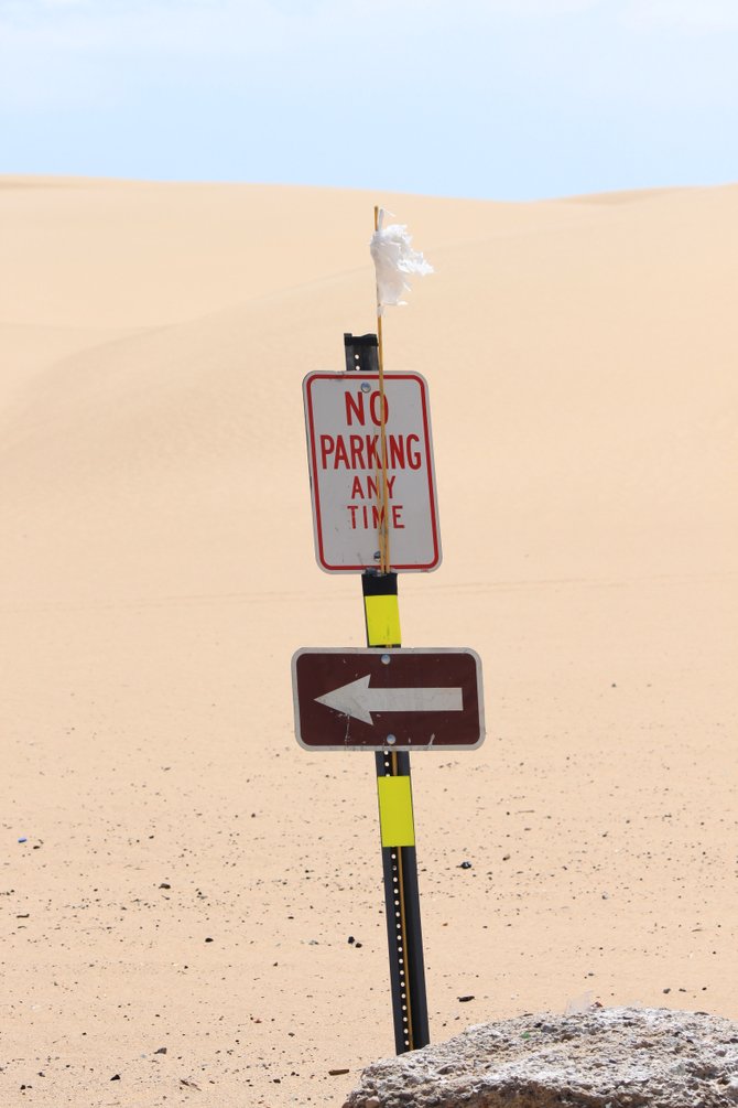 Lonely sign at Buttercup Sand Dunes just West of Yuma, AZ.