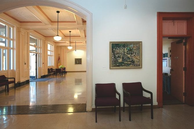 Ivan Messenger’s 1934 oil painting Senior Citizens hangs in its new home in the Parks and Recreation offices in Balboa Park.