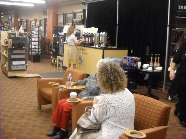 Mothers enjoy free Starbucks coffee at the Rockpile Coffee Station at the Rock Church on Mother's Day.