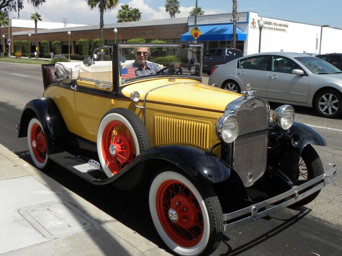 Jim Gates cruises on Grand in his 1930 Roadster, May 13, 2011.