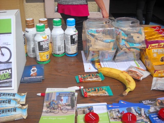 Free snacks and drinks table set up for Bike to Work Day at Performance Bike Shop.