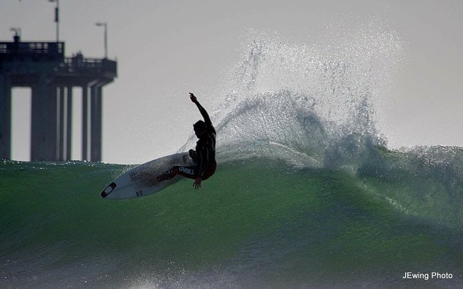 Surfer: Kyle Knox surfing OB winter waves.