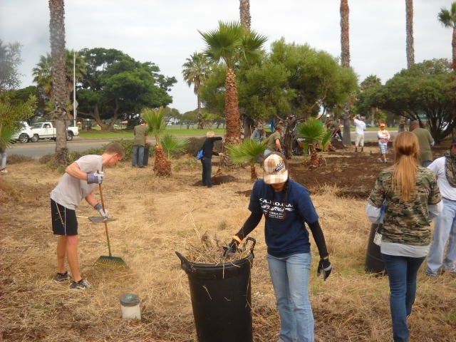 It's a dirty job, but someone has to do it on the corner of West Pt. Loma & Nimitz Blvd.