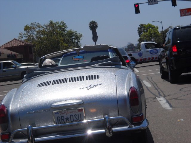 Spectacularly sparkly silver car along Midway Dr.
