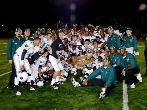 Helix players pose with the Claymore Sword, their rivalry trophy with Mount Miguel