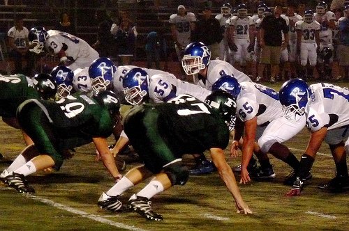 Ramona quarterback Nathan Hunt at the line of scrimmage