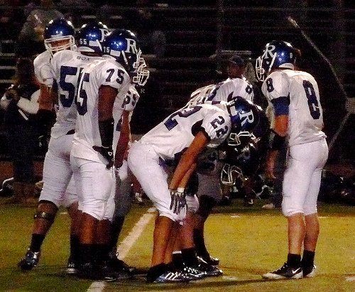 Ramona quarterback Nathan Hunt calls out the play in the huddle
