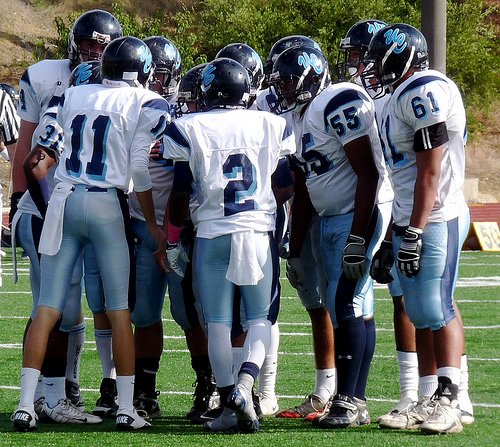 University City in the offensive huddle
