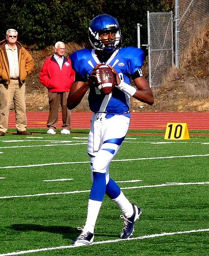 San Diego quarterback Khari Kimbrough rolls out to the right