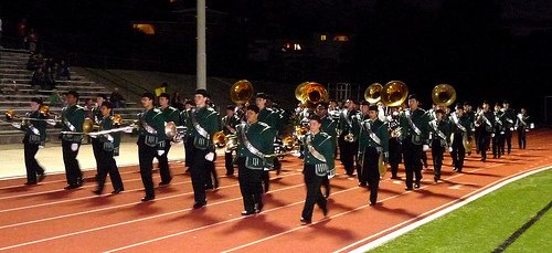 The Helix band marches in on the track