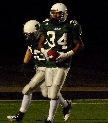 Helix defensive back Gary Thompson celebrates his interception return for a touchdown