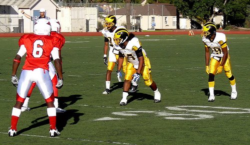 Mission Bay lines up three receivers wide with a pair of Hoover defensive backs across the line of scrimmage
