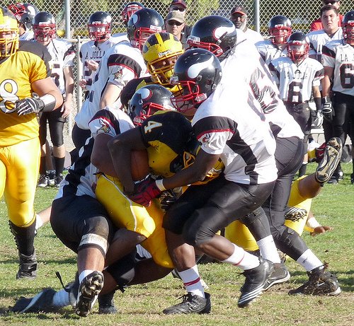 Mission Bay running back Chris Byrd swallowed up by two La Jolla defenders
