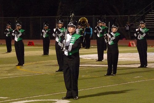 Poway’s Emerald Brigade marching band gets set to perform