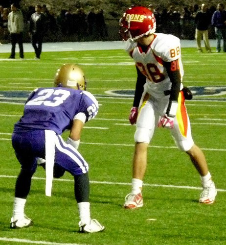 Cathedral Catholic receiver Chance Early pressed by St. Augustine defensive back Nicholas Gonsalves