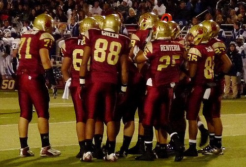 Mission Hills in the offensive huddle