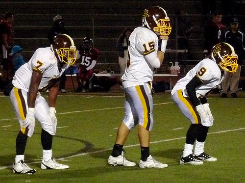 Francis Parker quarterback Warren Brody flanked by running backs Kenny Brookins (7) and Rochon Taylor (9)