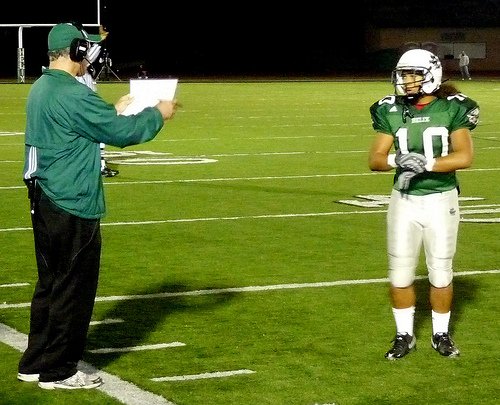 Helix linebacker Raymont Nailon gets the play call from head coach Troy Starr