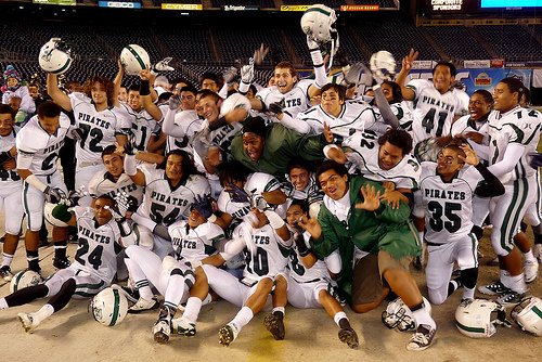 Oceanside players celebrate their seventh straight section title