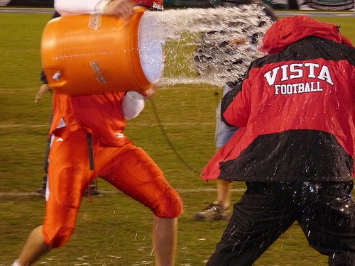Vista head coach Dan Williams can’t quite evade the ice water shower after the Panthers’ Division I title