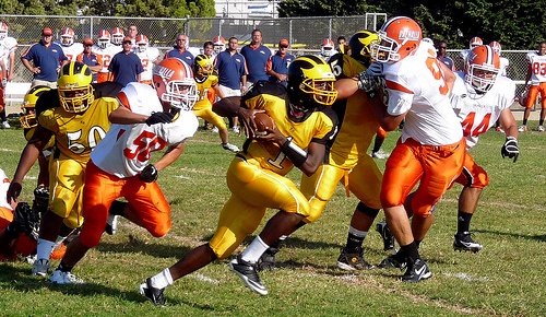 Mission Bay quarterback Nate Long takes off from the pocket
