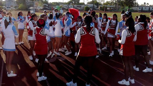 Hoover and San Ysidro cheerleaders join forces midway through the third quarter