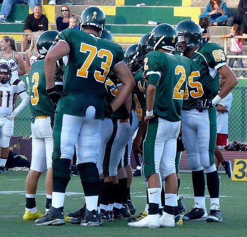 The Patrick Henry offensive huddle