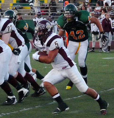 Point Loma running back Thomas Bell carries the ball outside