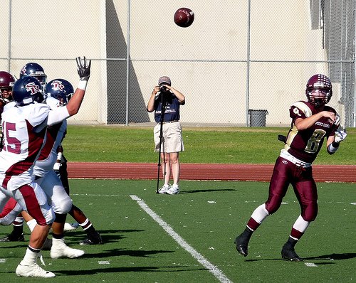 Point Loma quarterback Thomas Mize floats a pass over the Scripps Ranch defensive line