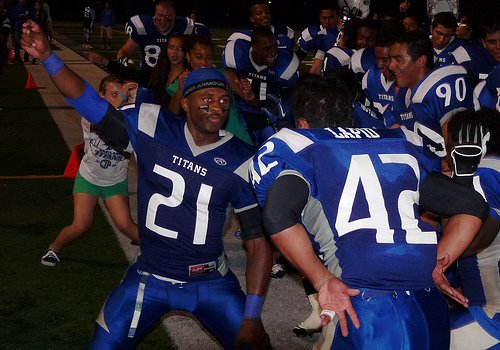 Eastlake running back John Fletcher celebrates the Titans win by busting a move with teammate Jesse Lapid