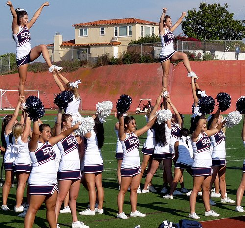 Steele Canyon cheerleaders pump up the visitor crowd