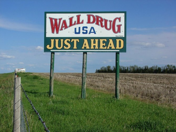 Up ahead: another sign for Wall Drug