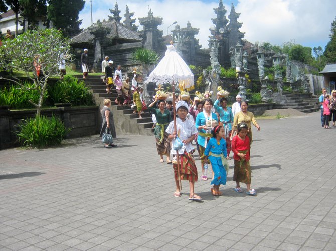 A ceremonial parade of offerings at the Besakih temple in Bali
