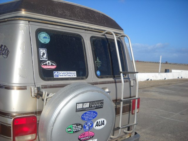 Sticker-laden beach van in North parking lot.