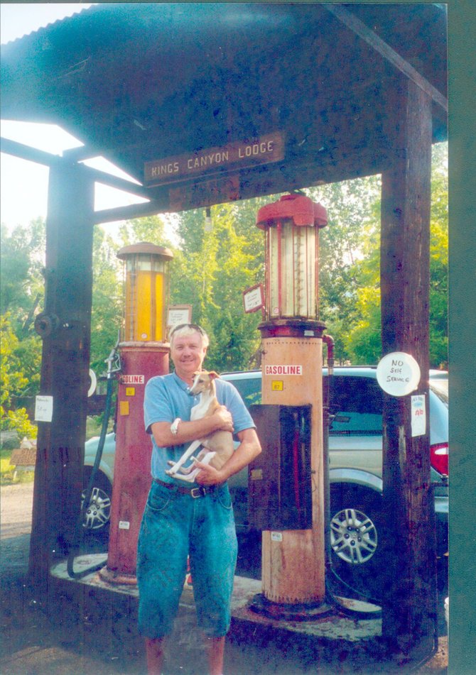 Ronnie and Bobo at Kings Canyon Lodge with historic working gas pumps.