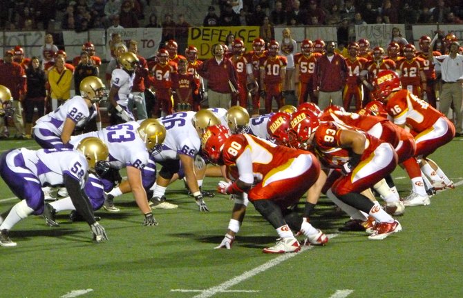 Cathedral Catholic's offense lines up across from St. Augustine's defense