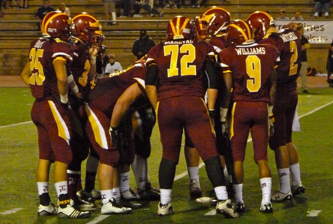 Torrey Pines in the offensive huddle
