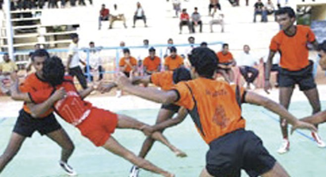 In kabaddi, defensive players try to trap, circle, tackle, drape themselves over the “marauding raider.” 