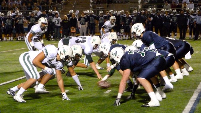 La Costa Canyon’s offense lines up against Oceanside’s defense