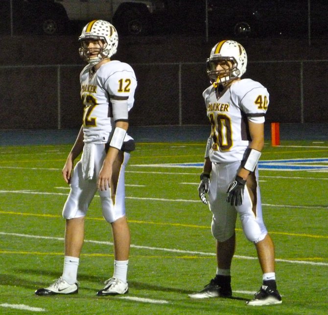 Francis Parker quarterback Gabe Harrington and running back Noah Gamboa (40) in the offensive backfield