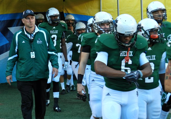 Helix head coach Troy Starr and the Highlanders take the field at Qualcomm Stadium for the Division II championship