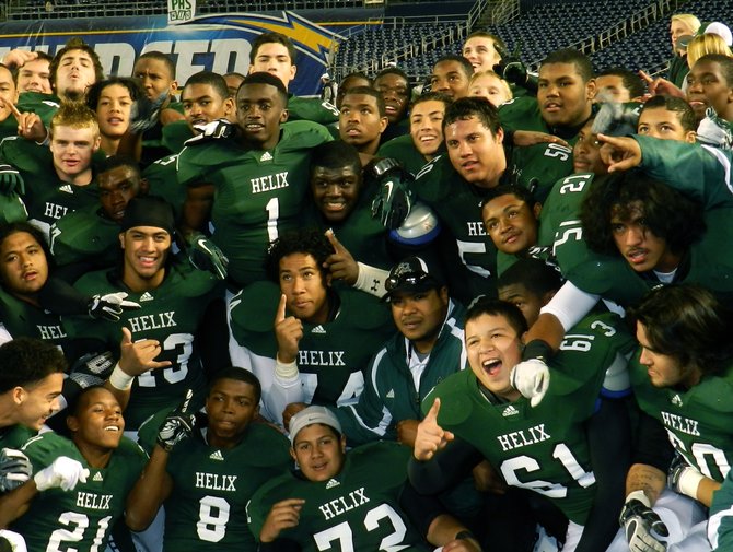 Helix players celebrate the Highlanders' first section title since 2001