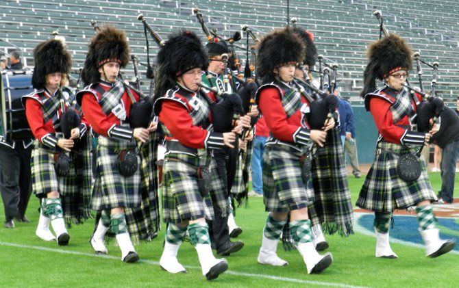 Helix bagpipe players lead the procession prior to the Division II State Bowl