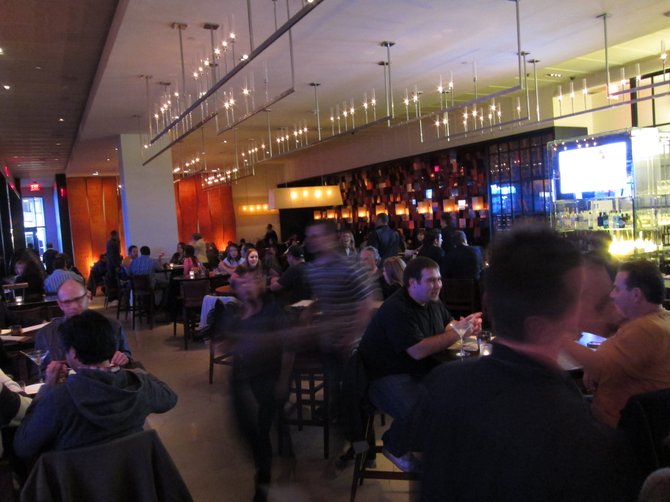 The crowded dining room of Wolfgang Puck's WP24 in Los Angeles.