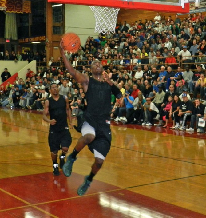 Lincoln guard Tyrell Robinson goes up for a layup