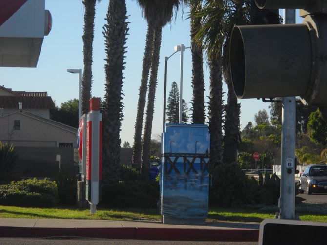 Utility box art on the corner of Palm Ave. in IB.