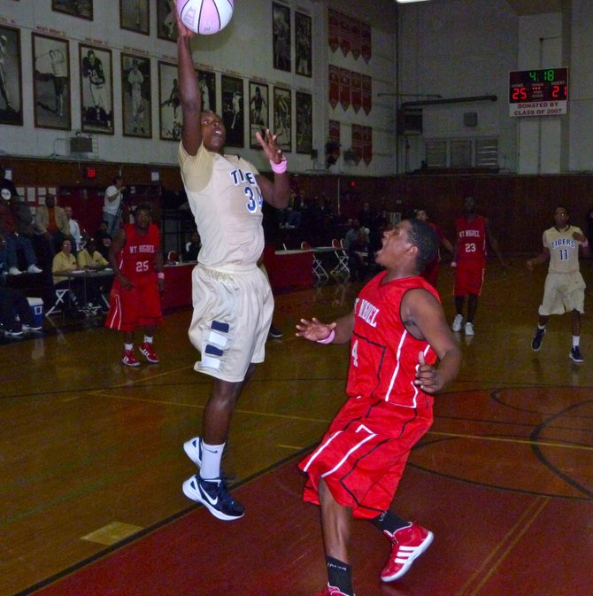 Morse forward Sean Sellers goes puts a layup up in the lane over Mount Miguel forward Malcolm Jackson