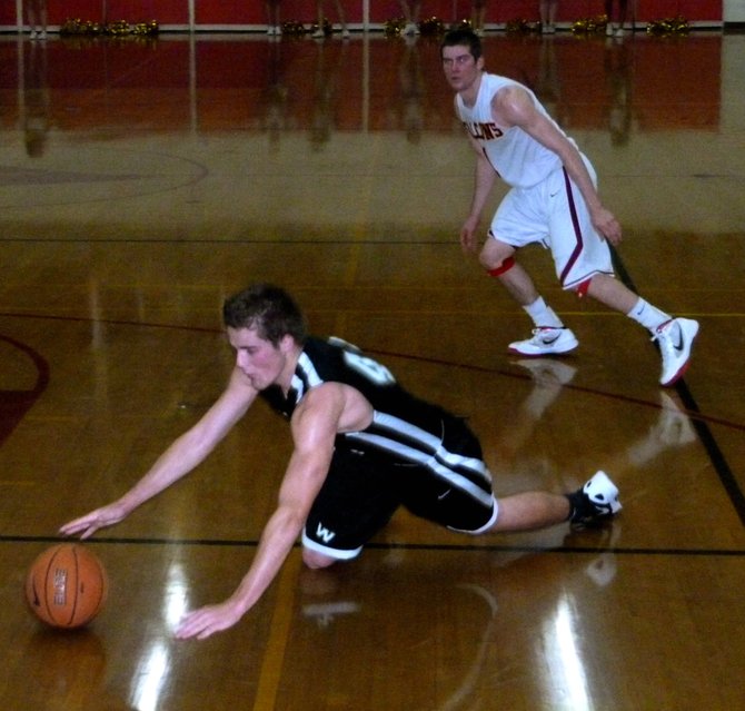 Westview forward Patrick Govea goes to the ground to chase down a loose ball